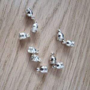 Lot 10 fermoirs argentés diam 0.5