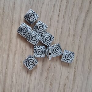 Perle acier motif spirale
