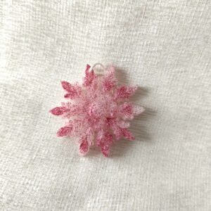 Givrelia blanc paillettes roses