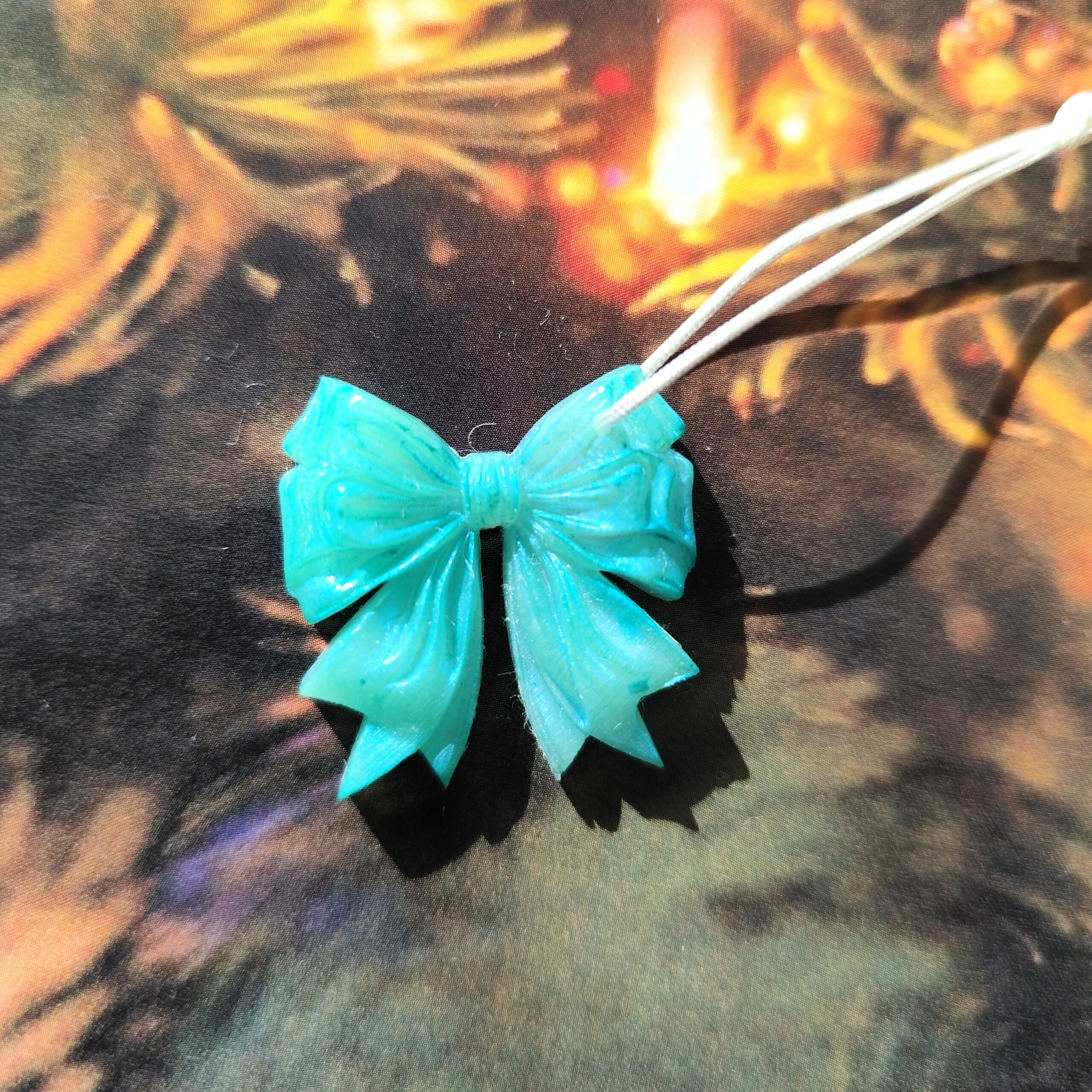 Nœud du bonheur vert brillant