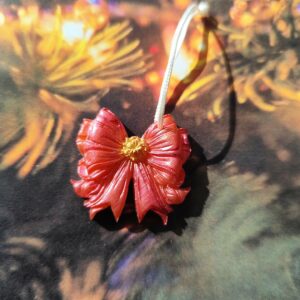 Nœud du bonheur rouge doré