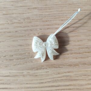 Nœud du bonheur blanc paillettes dorées