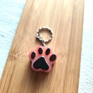 Porte clé "Pawpop" orange rose