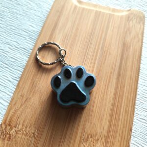 Porte clé "Pawpop" bleu gris